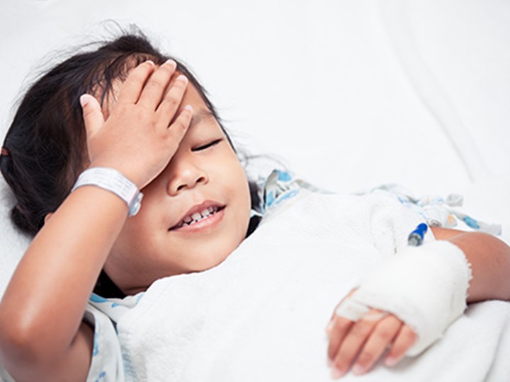 Krankes Kind im Bett